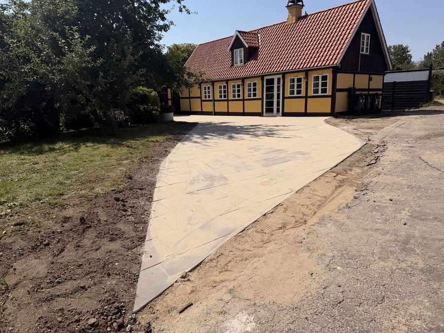 Fugesand over den nye belægning